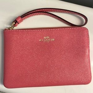Never used pink Coach wristlet